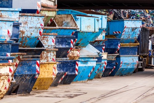 Builders skip being delivered to a construction site in Kingston upon Thames
